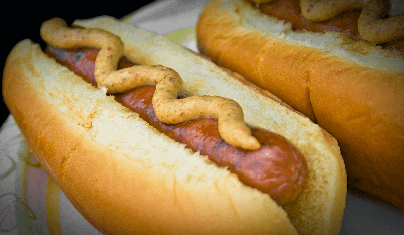 Image of a hot dog with mustard